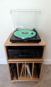 Charo handcrafted timber record player stand with elegant vinyl storage shelving