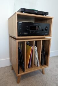 Charo solid timber record player stand with minimal vinyl storage design